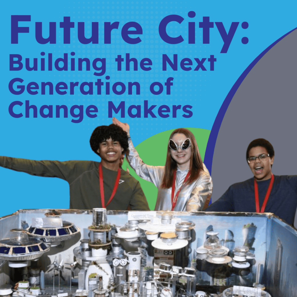 Three enthusiastic participants celebrating at the "Future City: Building the Next Generation of Change Makers" event, with a model of a futuristic city displayed in front of them.